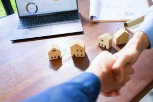 Successful agreement, estate, home buying contract. Real estate agent handshake, deal business