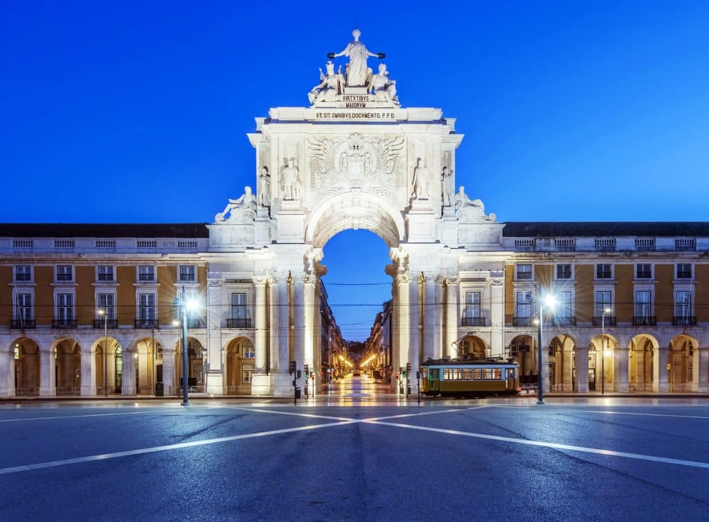 Illuminated ornate archway in Commerce Square, Lisbon, Lisbon, Portugal