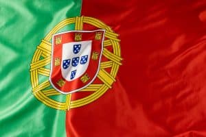 Image of close up of wrinkled national flag of portugal