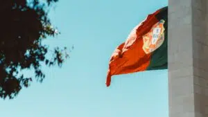 Portuguese flag against blue sky